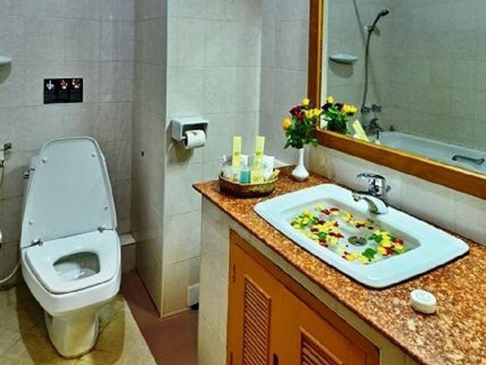 Win Unity Hotel Мемьо Экстерьер фото