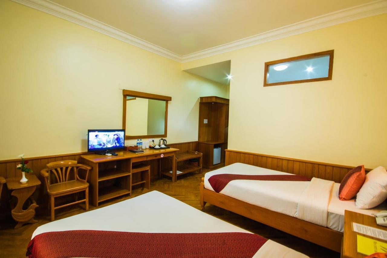 Win Unity Hotel Мемьо Экстерьер фото